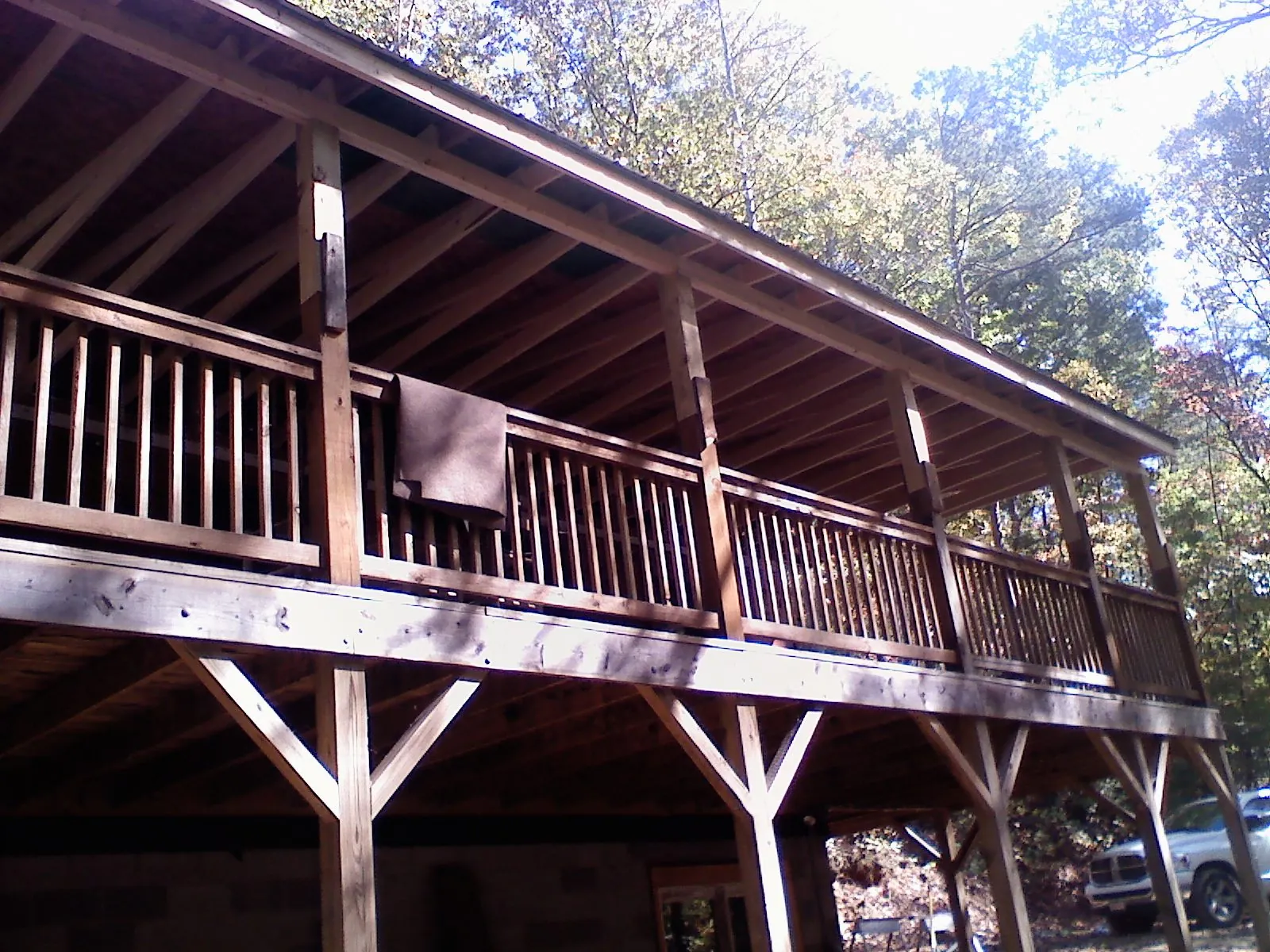 Timber framing under a new elevated porch and deck — Roof Leak Repair in Ellisburg by Roofing Brothers